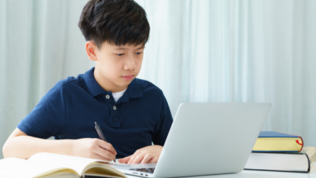 Student learning on a laptop