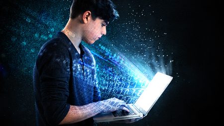 Teenager holding laptop