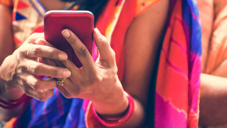 Indian woman using phone