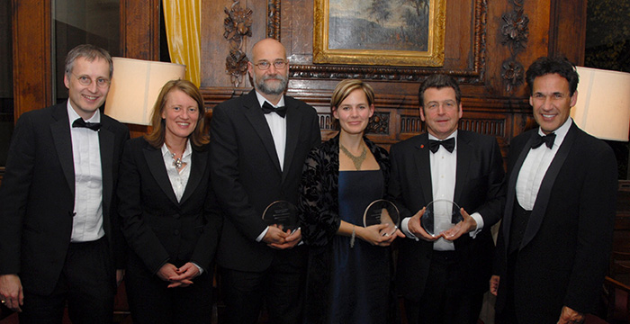 Viktor Mayer-Schoenberger, Helen Margetts, Yochai Benkler, Jennifer Pahlka, Pete Lomas (for Raspberry Pi), and Richard Susskind pose with their awards.