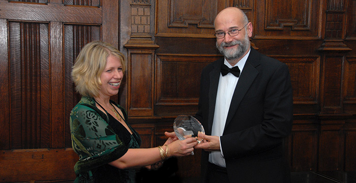 Yochai Benkler receives his Lifetime Achievement Award from OII Fellow Victoria Nash