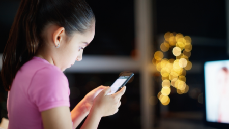 Girl looking at mobile phone